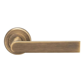 SEROZZETTA EDGE LEVER ON CONEALED FIXINGS ROUND ROSE Antique Brass